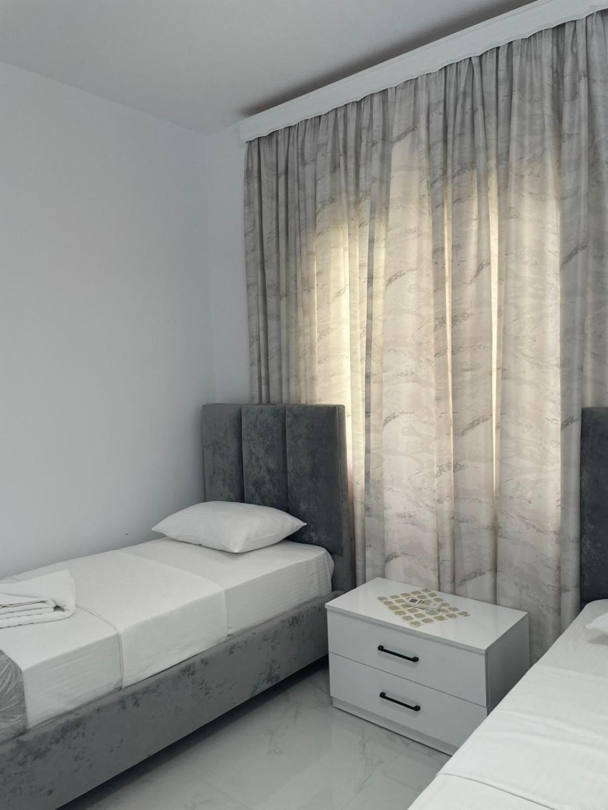 Vila Ori Ksamil Rom bilde